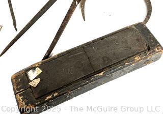 Calipers; compasses; whet stones 