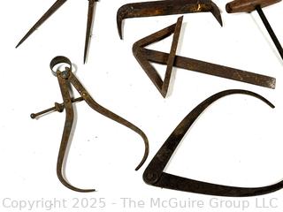 Calipers; compasses; whet stones 