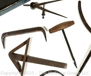 Calipers; compasses; whet stones 