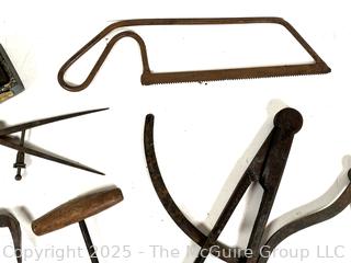 Calipers; compasses; whet stones 