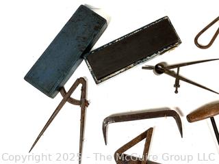 Calipers; compasses; whet stones 