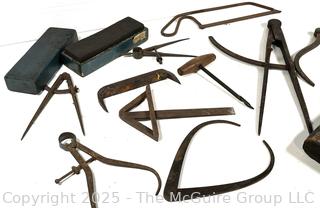 Calipers; compasses; whet stones 