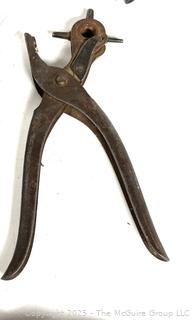 Antique tools: perforator; nail puller; leather hole punch; grommet vise; and 2 Cork Crimping Tool Cast Iron One Mounted on Wood Base by Seargent & Co
