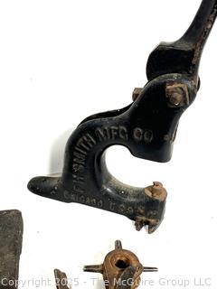 Antique tools: perforator; nail puller; leather hole punch; grommet vise; and 2 Cork Crimping Tool Cast Iron One Mounted on Wood Base by Seargent & Co