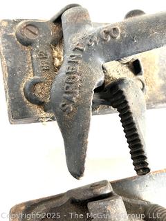 Antique tools: perforator; nail puller; leather hole punch; grommet vise; and 2 Cork Crimping Tool Cast Iron One Mounted on Wood Base by Seargent & Co