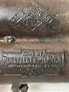 Antique Russell & Erwin tobacco grinder; ladle for molten lead; hide scraper; grommet press