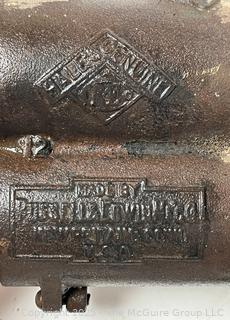 Antique Russell & Erwin tobacco grinder; ladle for molten lead; hide scraper; grommet press