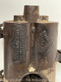 Antique Russell & Erwin tobacco grinder; ladle for molten lead; hide scraper; grommet press