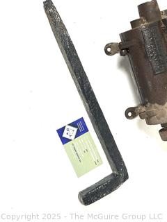 Antique Russell & Erwin tobacco grinder; ladle for molten lead; hide scraper; grommet press