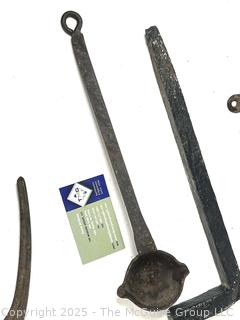 Antique Russell & Erwin tobacco grinder; ladle for molten lead; hide scraper; grommet press