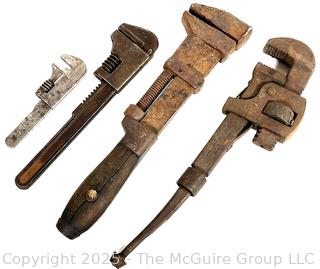 Four (4) vintage monkey wrenches