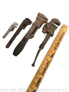 Four (4) vintage monkey wrenches