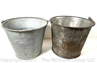 Two (2) galvanized steel buckets