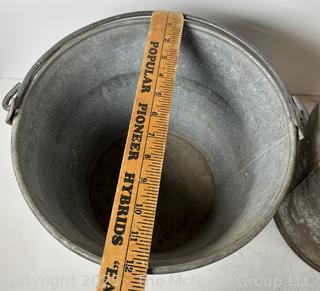 Two (2) galvanized steel buckets