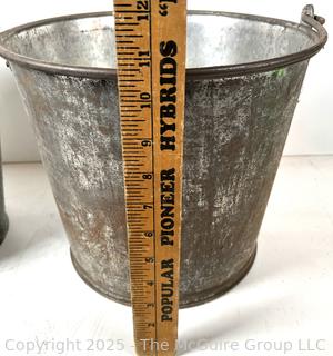 Two (2) galvanized steel buckets