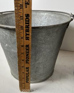 Two (2) galvanized steel buckets