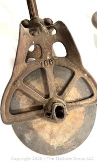 Grouping of cast iron pulleys including Lane Bros. Poughkeepsie NY 