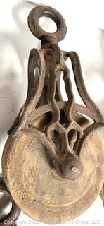Grouping of cast iron pulleys including Lane Bros. Poughkeepsie NY 