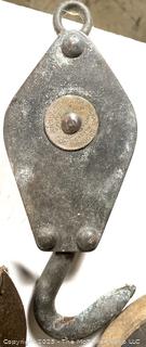 Grouping of cast iron pulleys including Lane Bros. Poughkeepsie NY 
