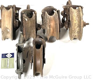 Grouping of cast iron pulleys including Lane Bros. Poughkeepsie NY 