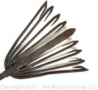 Antique forged iron rake