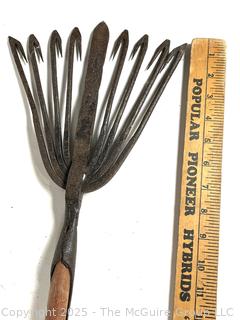 Antique forged iron rake