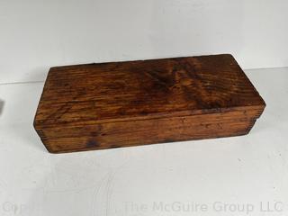 Wood box of tools: cold steel chisels and punches