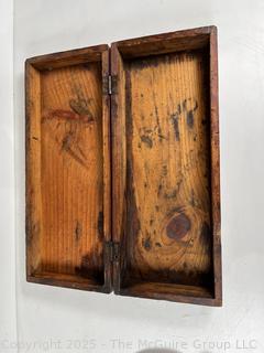 Wood box of tools: cold steel chisels and punches