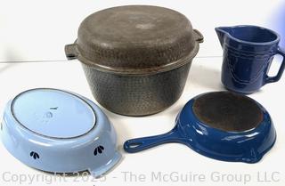 Cooking items: Vintage Le Winter Appliance Co Brushed Aluminum Hammered Dutch Oven 1930's; Le Creuset frying pan; and DRU Holland Blue Tulip Enameled Cast Iron Oval Baker Casserole Dish; blue ceramic creamer