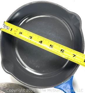 Cooking items: Vintage Le Winter Appliance Co Brushed Aluminum Hammered Dutch Oven 1930's; Le Creuset frying pan; and DRU Holland Blue Tulip Enameled Cast Iron Oval Baker Casserole Dish; blue ceramic creamer