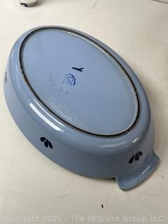 Cooking items: Vintage Le Winter Appliance Co Brushed Aluminum Hammered Dutch Oven 1930's; Le Creuset frying pan; and DRU Holland Blue Tulip Enameled Cast Iron Oval Baker Casserole Dish; blue ceramic creamer