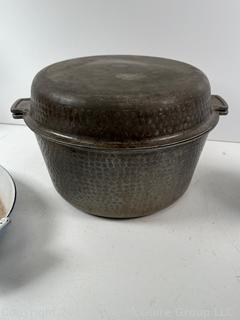 Cooking items: Vintage Le Winter Appliance Co Brushed Aluminum Hammered Dutch Oven 1930's; Le Creuset frying pan; and DRU Holland Blue Tulip Enameled Cast Iron Oval Baker Casserole Dish; blue ceramic creamer