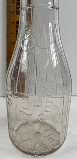 Group of three (3) antique glass milk bottles: various brands