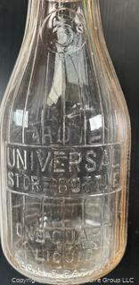 Group of three (3) antique glass milk bottles: various brands