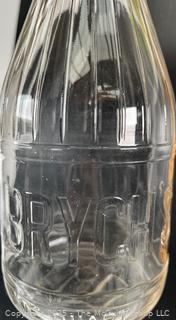 Group of three (3) antique glass milk bottles: various brands