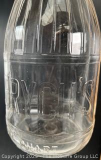 Group of three (3) antique glass milk bottles: various brands