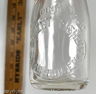 Group of five (5) antique glass pint milk bottles: various brands