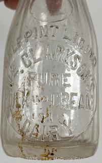Group of five (53) antique glass milk pint bottles: various brands