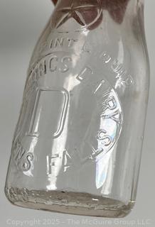 Group of five (53) antique glass milk pint bottles: various brands