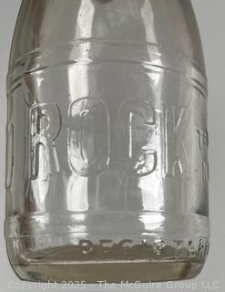 Group of five (53) antique glass milk pint bottles: various brands