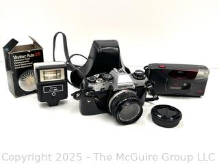 Olympus OM-10 35mm film camera and Vivitar Flash; and Concord AFF 35MMCamera AUTO FOCUS FLASH CAMERA