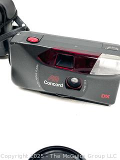Olympus OM-10 35mm film camera and Vivitar Flash; and Concord AFF 35MMCamera AUTO FOCUS FLASH CAMERA