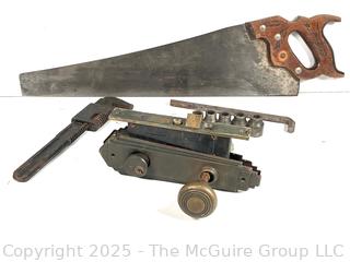 Hand tools and Hardware: Keyed door lock; hex-key socket set; cross-cut hand saw (Challenger by DISSTON); and adjustable wrench