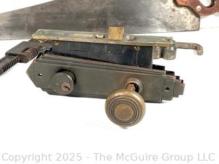 Hand tools and Hardware: Keyed door lock; hex-key socket set; cross-cut hand saw (Challenger by DISSTON); and adjustable wrench