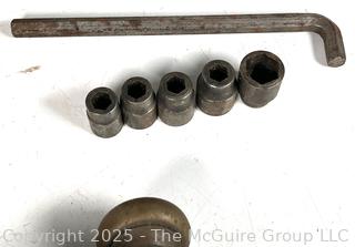 Hand tools and Hardware: Keyed door lock; hex-key socket set; cross-cut hand saw (Challenger by DISSTON); and adjustable wrench