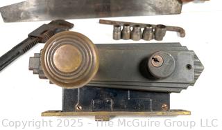Hand tools and Hardware: Keyed door lock; hex-key socket set; cross-cut hand saw (Challenger by DISSTON); and adjustable wrench