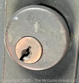 Hand tools and Hardware: Keyed door lock; hex-key socket set; cross-cut hand saw (Challenger by DISSTON); and adjustable wrench