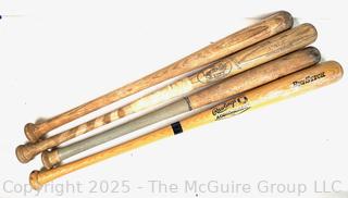 Four (4) wood baseball bats: Rawlings Big Stick Adirondack Pro Model; Louisville Slugger Yankees Baseball Bat, M110; and others