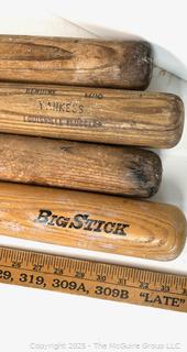Four (4) wood baseball bats: Rawlings Big Stick Adirondack Pro Model; Louisville Slugger Yankees Baseball Bat, M110; and others
