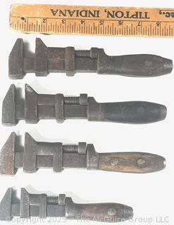 Four (4) vintage adjustable monkey wrenches including COES and Sargeant 